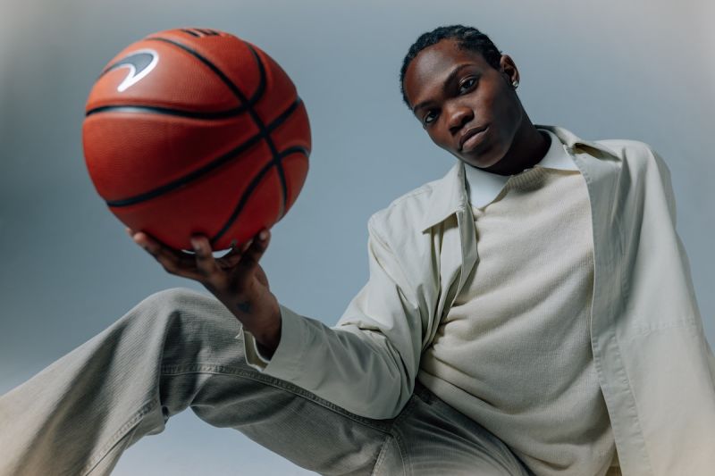 female basketball player holding ball