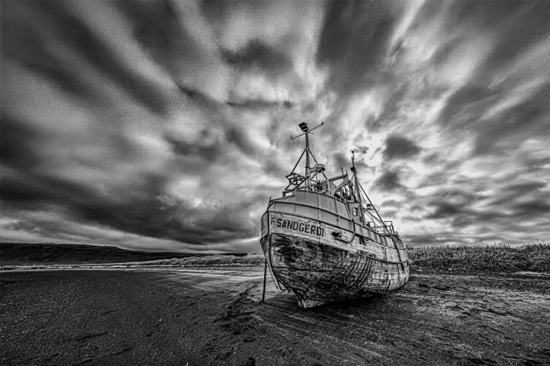 beached ship in b/w