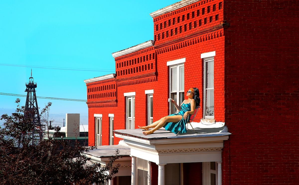 woman sunning on roof